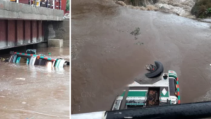 truck in Nala Driver, Conductor Escape Unhurt As Truck Plunges Into Nallah In Ajas Bandipora