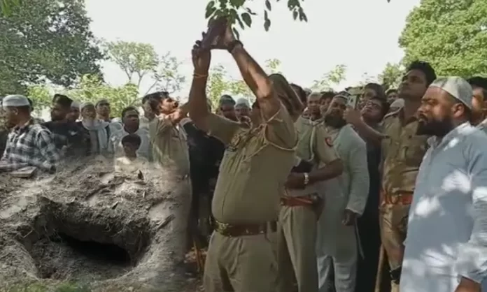 कब्रिस्तान में 1 दिन पहले दफन किया नवजात का शव पेड़ पर रखा मिला, सूचना पर गांव मचा हड़कंप